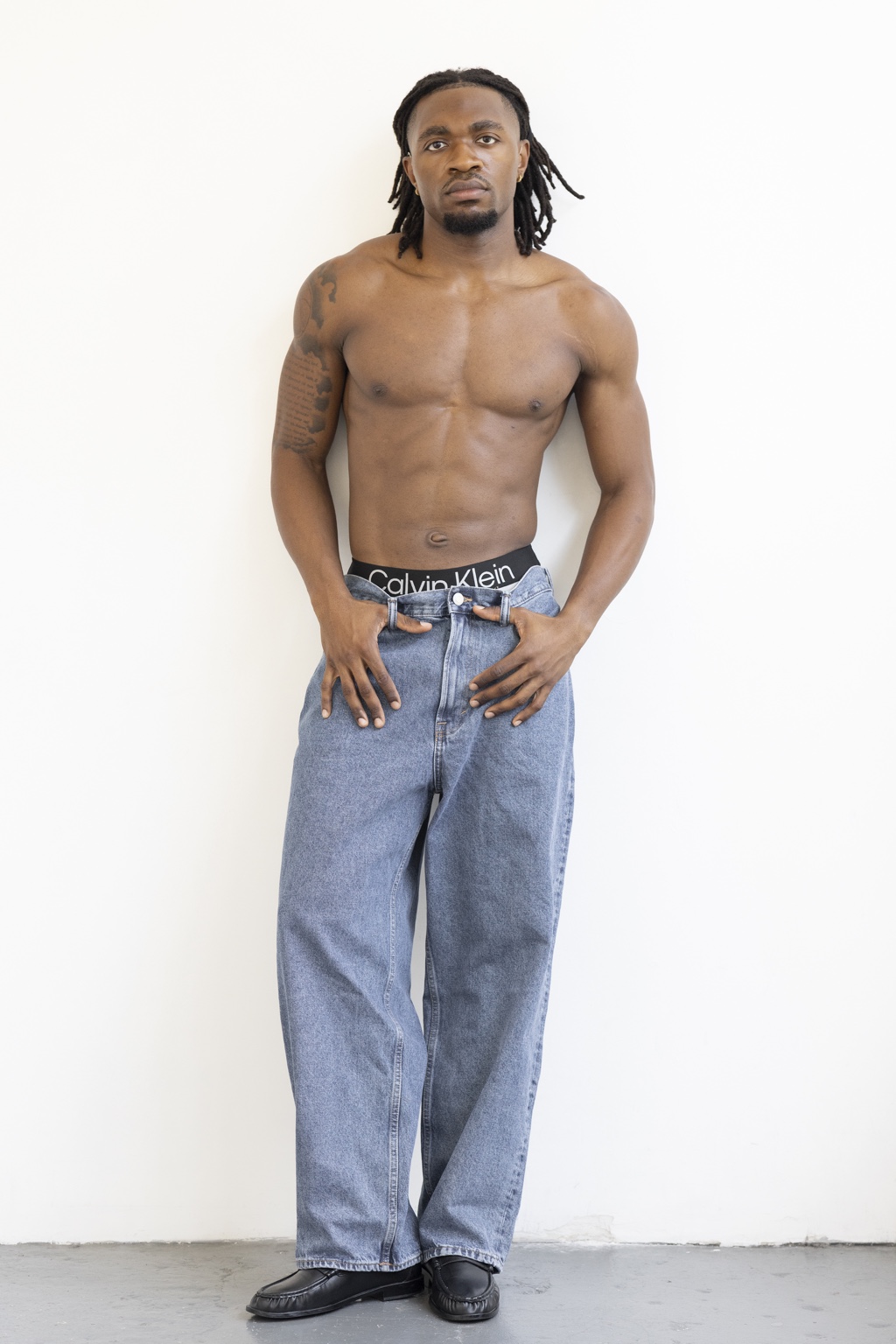 Studio fashion pose by Enow Otto Jr