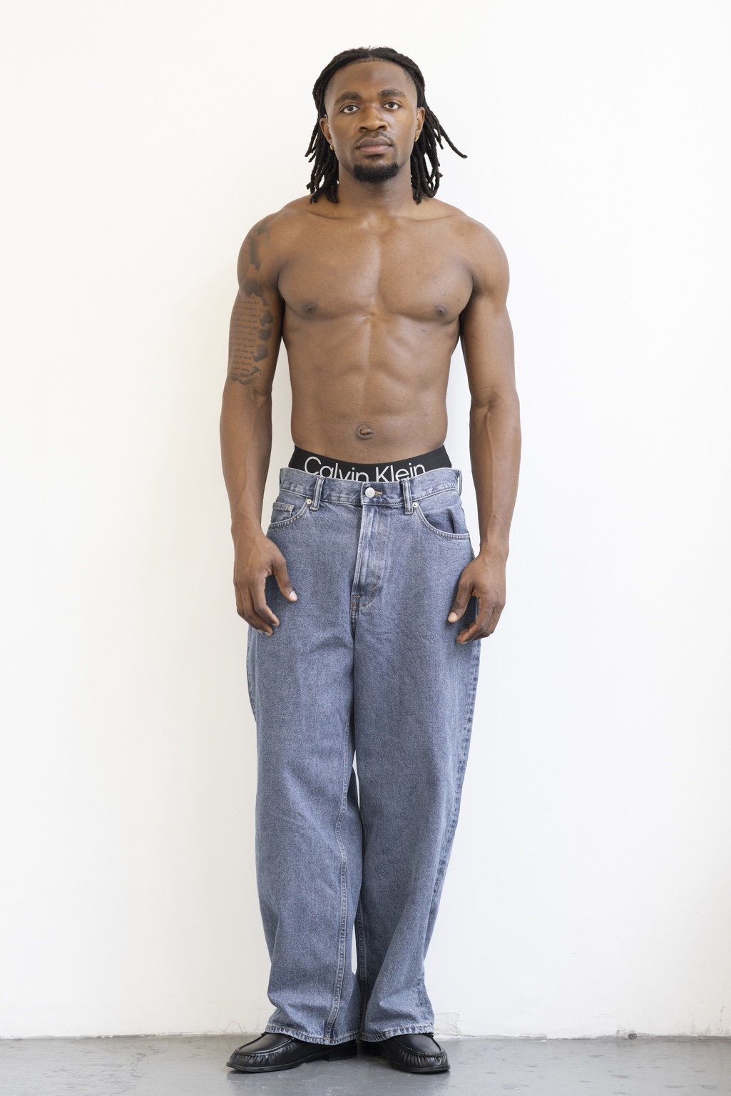 Full-body studio digital of Enow Otto Jr